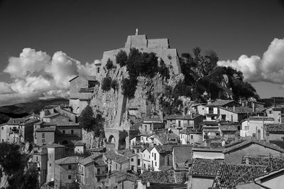 Aerial view of townscape against sky