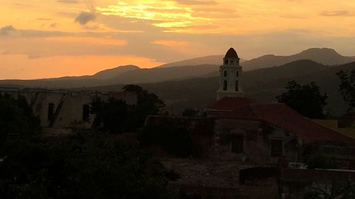 Scenic view of mountains against sky at sunset