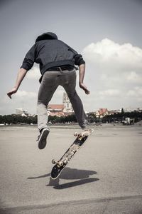 Full length of woman jumping in mid-air