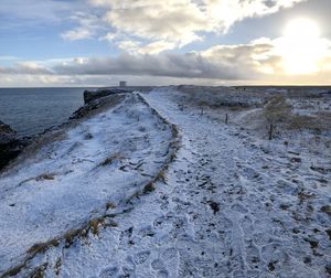 Scenic view of sea against sky during sunset