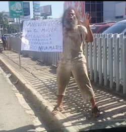 Rear view of man walking on street