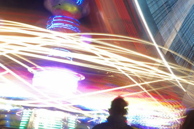 Blurred motion of people at night