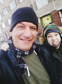 Portrait of smiling man and woman in winter