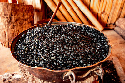 High angle view of coffee beans in bowl