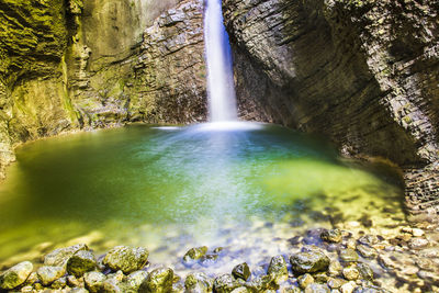 Kozjak waterfall. emerald water. caporetto, slovenia.