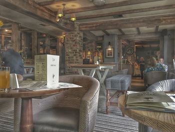 Chairs and table in illuminated room