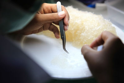 Close-up of person preparing food