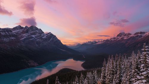 Scenic view of mountains against sky at sunset