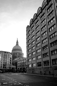 Buildings in city against sky