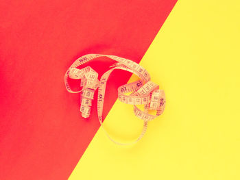 Close-up of yellow text against red background