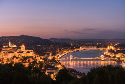 High angle view of illuminated city at night