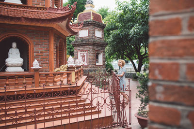 Statue in front of building