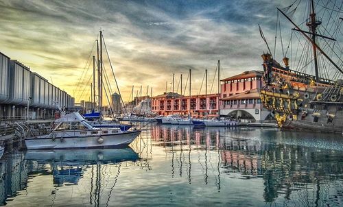 Boats moored at harbor