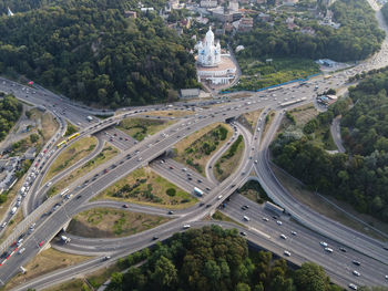 High angle view of highway amidst trees in city