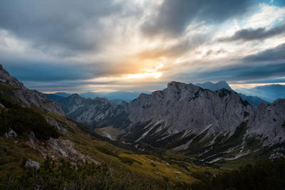 Scenic view of mountains against sky during sunrise