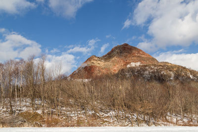 Scenic view of mountains against sky during winter