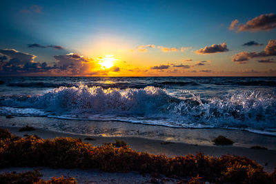 Scenic view of sea against sky during sunset