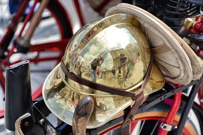 High angle view of metal helmet on bicycle carriage