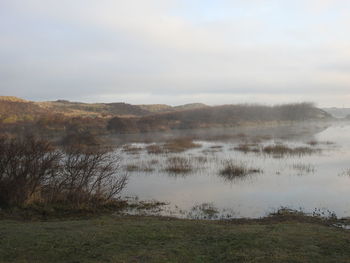 Scenic view of lake against sky