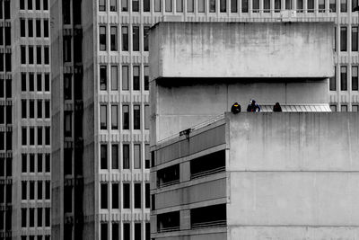 Men at building terrace