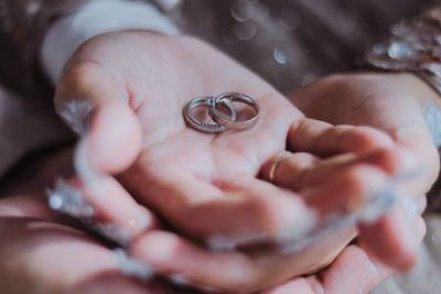 Close-up of person holding hands