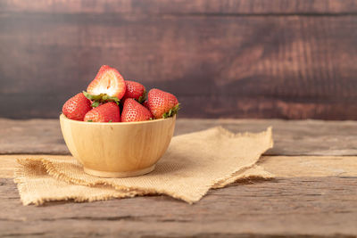 Close-up of fruits in bowl on table