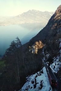 Scenic view of snow covered mountains against sky