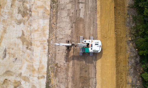 Aerial view of construction machinery on landscape