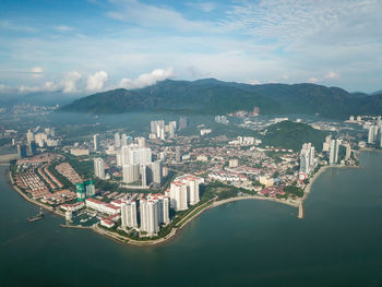 High angle view of city and buildings against sky