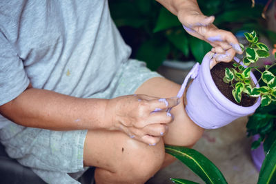 High angle view of woman holding hands