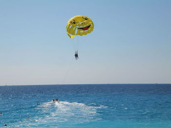 People surfing in sea