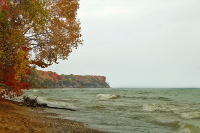 Scenic view of sea against sky during autumn