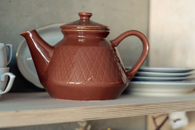 Close-up of teapot on table