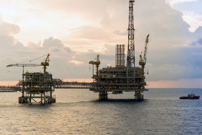 Seascape of an oil production platform during sunset at offshore terengganu oil field