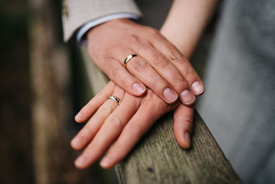 Cropped hand of man holding hands