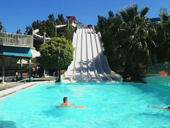 Tourists in swimming pool