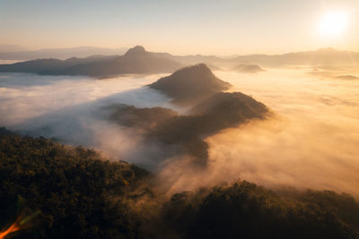 Scenic view of mountains against sky during sunset