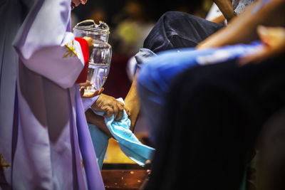 Cleansing the feet of the apostles holy thursday night at the church of st. theresa hua hin.