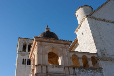 Low angle view of cathedral against clear blue sky