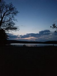 Scenic view of sea against sky at sunset