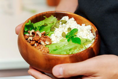 Close-up of hand holding food