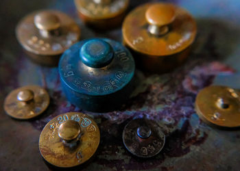 High angle view of coins on table