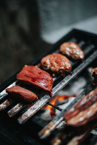 Close-up of meat on barbecue grill