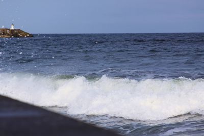 Scenic view of sea against clear sky