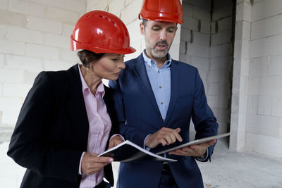 Portrait of man working at construction site