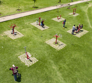 High angle view of people playing in grass