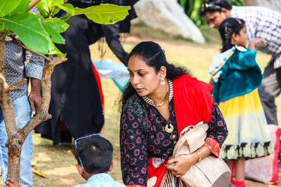 Families on field in park