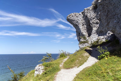 Scenic view of sea against blue sky