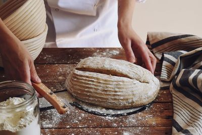 Midsection of man preparing food