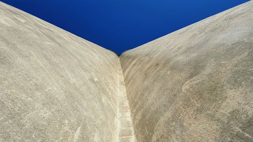 View of built structure against blue sky